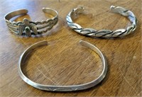 Three Silver Cuff Bracelets
