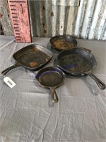 4 cast iron pans