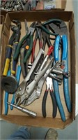 Flat of various pliers and snips.