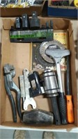 Flat of blades, socket adapters, various tools.