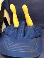 Stadium cushion with “horned” hat