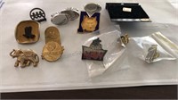 Assorted pins and cufflinks