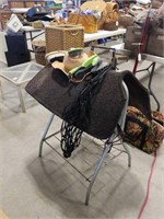 Cowboy hat, saddle pad, saddle rack, hay net and