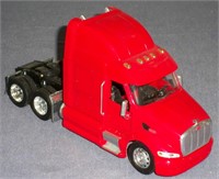 Red Peterbilt Overcab Semi truck