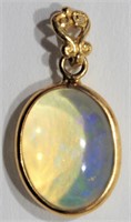 $600. 14K Opal Pendant