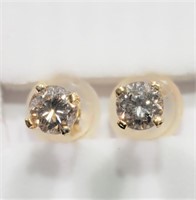 $1250. 14K Fancy Diamond Earrings