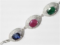 $890. SS Ruby Sapphire Emerald Bracelet