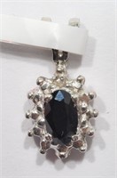 $700. 14K Sapphire Diamond Pendant