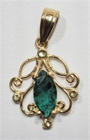 $1000. 14K Emerald Pendant