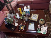 Lot of misc items on coffee table