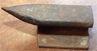 small anvil stamped "8"