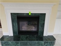 Vented Gas fireplace and mantle