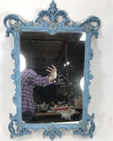 Blue ornate mirror