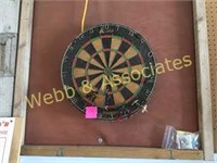 dart board and darts