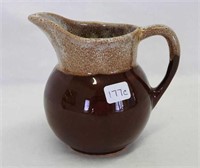 Watt Pottery #62 creamer, brown w/white drip