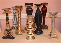 8 Unmatched Candle Stands, ranging from 10 1/2"