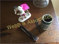 Horse statue, tuning fork, straight razor and