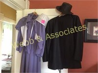 Man and woman's Amish clothing with hats