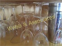 Contents of second shelf: stemware, vases,