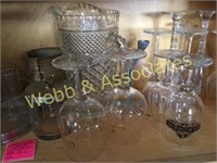 Contents of lower shelf: stemware, vases, glasses,