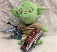 Yoda plush toy and Space Cruiser