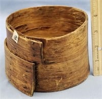Bentwood bowl put together with baleen pegs