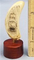 3" fossilized ivory tooth, scrimmed with a sailing