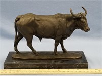 Bronze cast of a bull by Milo, mounted on marble s