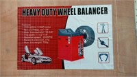 Unused 110 volt, 60 hz Heavy Duty Wheel Balancer