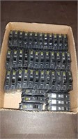 FLAT OF SQUARED 15 AMP CIRCUIT BREAKERS 42 PIECES