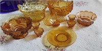 Amber glass bowls, basket, salts, Two are Fenton,