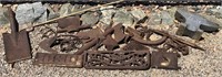 Assorted rusty metal yard art, anvil