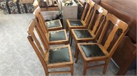 Six wooden chairs with leather seat