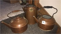Three copper kettles