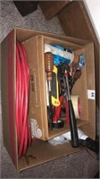 Box of hand tools and extension cord