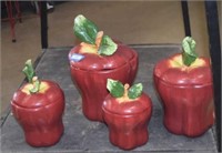 Four Apple Themed Canisters
