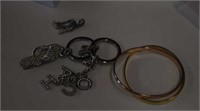 Two Bangle Bracelets Marked Cartier,