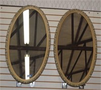 Two Framed Oval Wall Mirrors