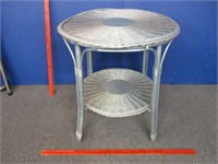 older wicker round side table (26in diameter)