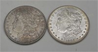 (2) Morgan Silver Dollars: 1902o unc, 1904o toned