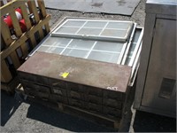 Pallet of windows and parts cabinet