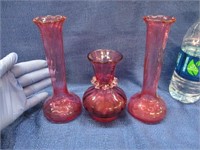 3 pink glass vases