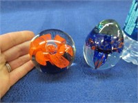 2 glass paperweights (unmarked)
