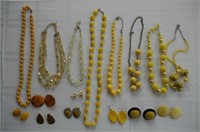 Assorted yellow and orange crystal beads,