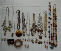 Assorted earth tone and amber beaded necklaces
