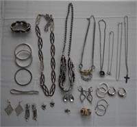 Assorted silver tone necklaces, earrings,