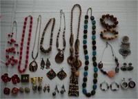 Assorted earth tone and red necklaces, earrings,
