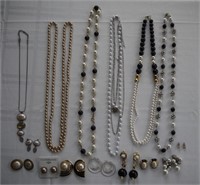 Assorted gold, silver tone, black, and pearl