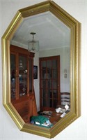 Gold framed beveled glass wall mirror