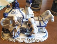 Blue and white porcelain carriage with horses